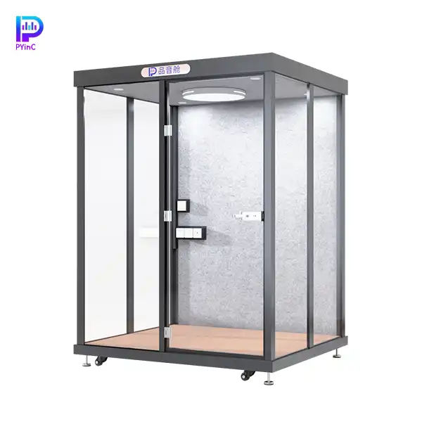 PYinC 1-4 person soundproof meeting pod in black, featuring three glass panels and left-opening door.