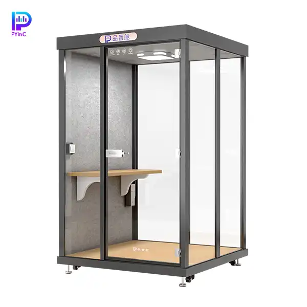 PYinC 1-2 person soundproof office pod in black, with a desk, three glass panels, and right-opening door.